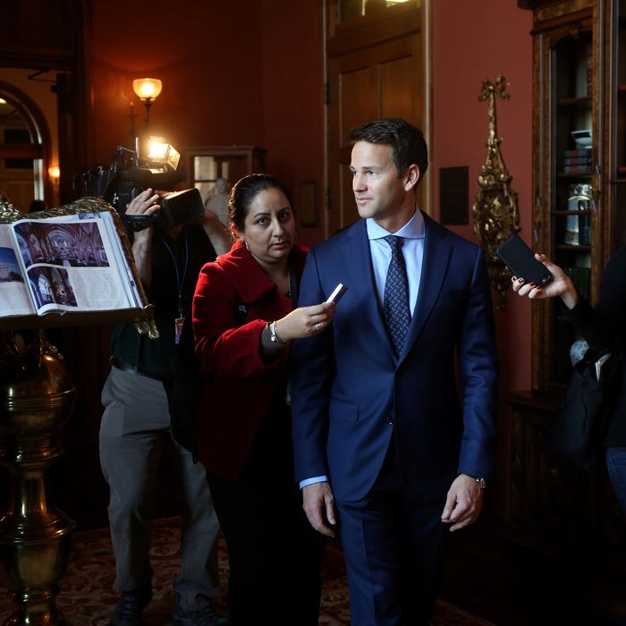 Congressman Aaron Schock speaks to the media as he arrives at an immigration reform panel hosted by the Illinois Business Immigration Coalition Monday, March 9, 2015, at St. Ignatius College Prep in Chicago. Schock resigned Tuesday amid controversy over his spending habits. (Nancy Stone/Chicago Tribune/TNS via Getty Images)
