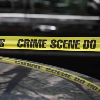 NEW YORK, NY - AUGUST 22: Crime scene tape at the funeral for former 