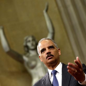WASHINGTON, DC - MAY 28: U.S. Attorney General Eric Holder speaks during a naturalization ceremony at the U.S. Department of Justice May 27, 2013 in Washington, DC. During the event Citizenship and Immigration Services Director Alejandro Mayorkas administered the Oath of Citizenship to approximately 70 new U.S. citizens. (Photo by Win McNamee/Getty Images)