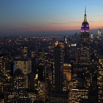 NEW YORK, NY - FEBRUARY 13: The Empire State Building towers over the Manhattan skyline on February 13, 2012 in New York City. The owner of the Empire State Building, Malkin Holdings, plans to raise up to $1 billion in an initial public offering on the 102 story Manhattan landmark. (Photo by John Moore/Getty Images)