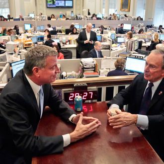 New York City Mayor-elect Bill de Blasio, left, joins Mayor Michael Bloomberg for a meeting in the 