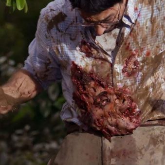 A married couple gets their car stuck in a muddy ditch but their attempts to extract the vehicle are thwarted when the husband is splattered with a shirtload of mud. Only, that's not mud! It's a dead-person's face! And now it's on his shirt! Gah!