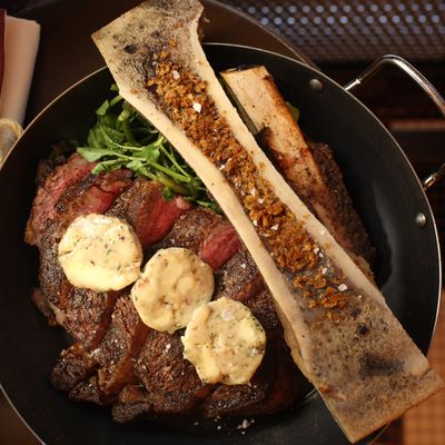At least the $95 32-ounce cowboy rib-eye for two comes with roasted bone marrow.