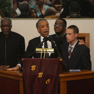 NEW YORK, NY - JULY 23: Reverend Al Sharpton introduces Ramey Ortiz, the civilian who video recorded the incident with the NYPD and the late Eric Garner, during the funeral service for Eric Garner held at Bethel Baptist Church on July 23, 2014 in the Brooklyn borough of New York City. Garner, 43, died after police put him in a chokehold outside of a convenience store on Staten Island for illegally selling cigarettes. (Photo by Julia Xanthos-POOL/Getty Images)