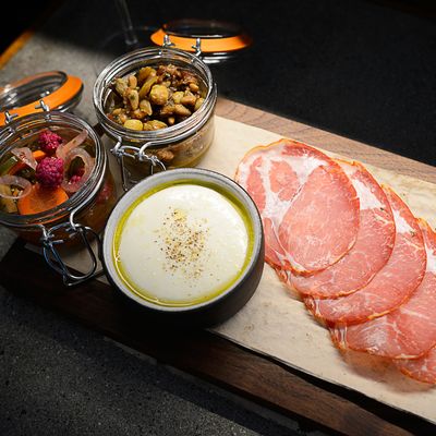 Mozzarella board: The mozzarella is hand-pulled to order, and served with a choice of salumi or verdure like eggplant caponata or pickled vegetables.