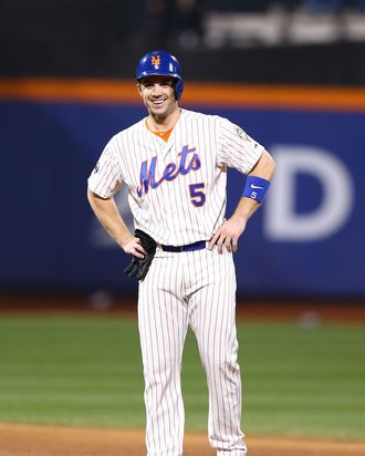 David Wright #5 of the New York Mets stands on base after passing Ed Kranepool as the New York Mets all time hits leader with 1419 during the third inning outfield their game on September 26, 2012 at Citi Field.