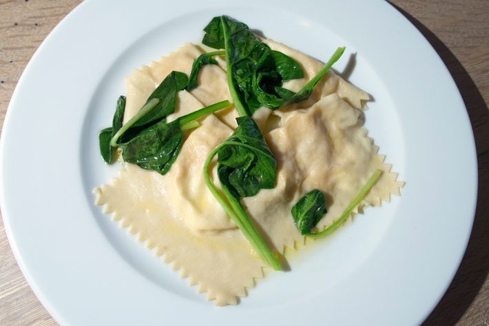 Ravioli of king crab and mascarpone with spinach.
