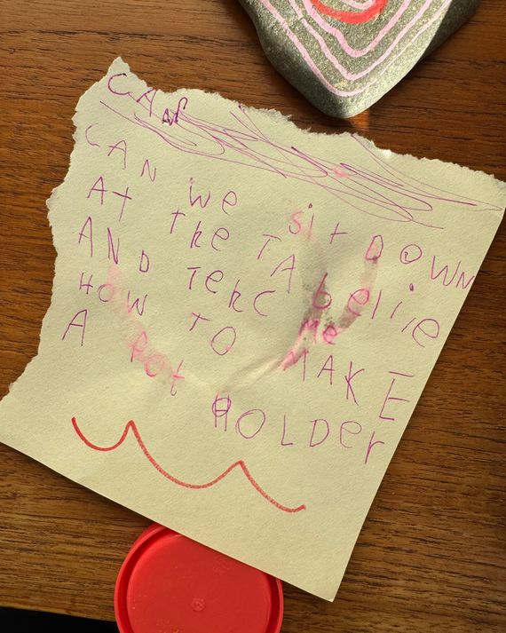 A note in child's handwriting that reads: