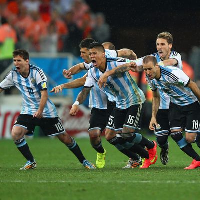  Lionel Messi, Pablo Zabaleta, Martin Demichelis, Marcos Rojo, Lucas Biglia, Javier Mascherano, Rodrigo Palacio and Ezequiel Garay of Argentina celebrate defeating the Netherlands in a shootout during the 2014 FIFA World Cup Brazil Semi Final match between the Netherlands and Argentina at Arena de Sao Paulo on July 9, 2014 in Sao Paulo, Brazil.