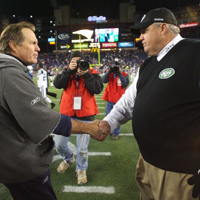 Bill Belichick of the New England Patriots shakes hands with Rex Ryan of the New York on November 22, 2009 in Foxboro, Massachusetts.