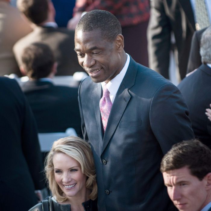 Former White House Press Secretary Dana Perino stands with former NBA Houston Rockets player Dikembe Mutombo before a dedication ceremony at the George W. Bush Library and Museum on the grounds of Southern Methodist University April 25, 2013 in Dallas, Texas. The Bush library is dedicated to chronicling the presidency of the United State's 43rd President, George W. Bush.