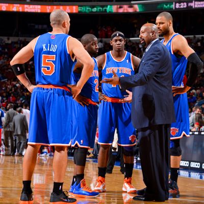 Head Coach Mike Woodson of the New York Knicks speaks to players Jason Kidd #5, Raymond Felton #2, Ronnie Brewer #11 and Tyson Chandler #6 while playing the Philadelphia 76ers at the Wells Fargo Center on November 5, 2012 in Philadelphia, Pennsylvania. 