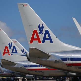 MIAMI, FL - FEBRUARY 07: American Airline planes are seen at the Miami International Airport on February 7, 2013 in Miami, Florida. Reports indicate that a deal between American Airlines and US Airways to merge may be set for early next week. If the deal goes through it would create the world's biggest airline. (Photo by Joe Raedle/Getty Images)