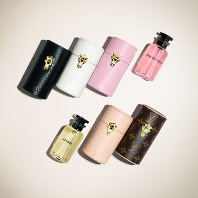 Louis Vuitton, a monogram perfume travel case, designed in a cylindrical  shape with the maker's sign