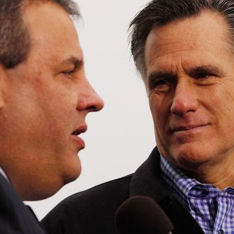 Former Massachusetts Governor and Republican presidential candidate Mitt Romney (R) and New Jersey Governor Chris Christie appear together at a campaign rally at a Hy Vee supermarket December 30, 2011 in West Des Moines, Iowa. Christie, a popular Republican governor who was urged to run for president earlier this year, appeared with Romney just days before the 