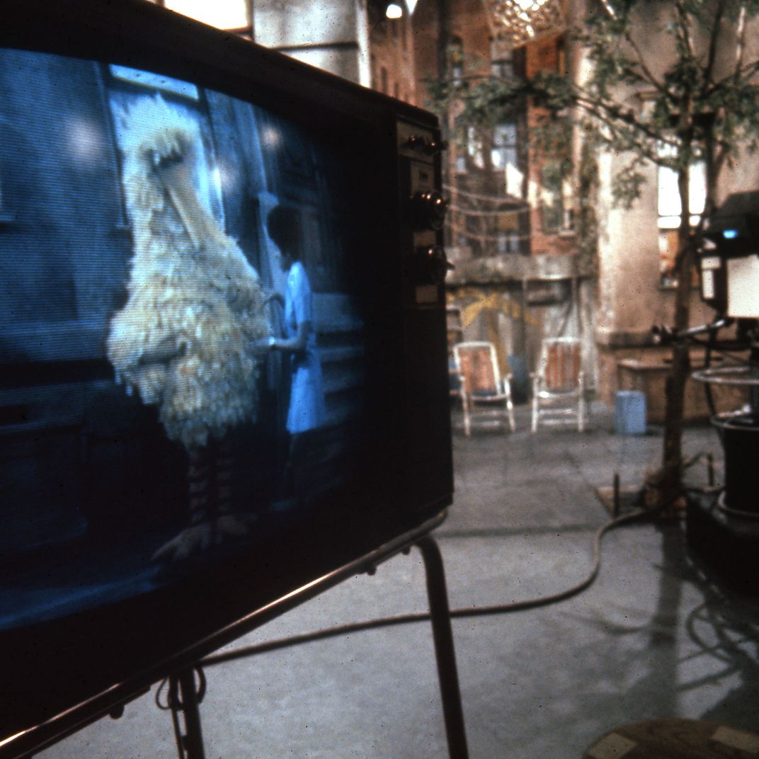Carroll Spinney, as Big Bird, rehearses with Loretta Long, as Susan.