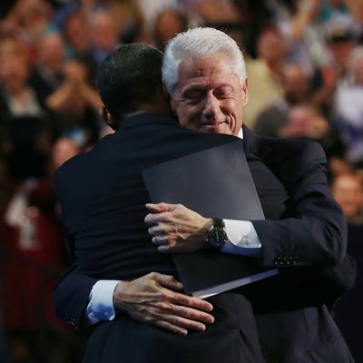 CHARLOTTE, NC - SEPTEMBER 05: U.S. President Bill Clinton hugs Democratic presidential candidate, U.S. President Barack Obama (L) on stage during day two of the Democratic National Convention at Time Warner Cable Arena on September 5, 2012 in Charlotte, North Carolina. The DNC that will run through September 7, will nominate U.S. President Barack Obama as the Democratic presidential candidate. (Photo by Justin Sullivan/Getty Images)