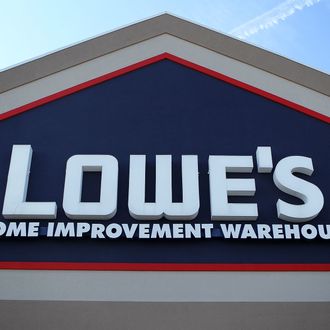ALEXANDRIA, VA - OCTOBER 17: The sign of a Lowe’s store is seen October 17, 2011 in Alexandria, Virginia. Lowe's has announced that the company will close 20 of it's 1,725 stores and cut about 2,000 jobs. (Photo by Alex Wong/Getty Images)