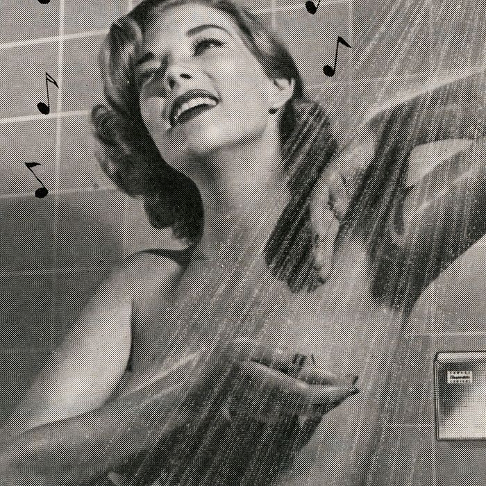 Retro woman showering, for The Strategist's review of a Thai all-natural deodorant spray.