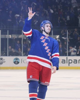 Chris Kreider #20 of the New York Rangers waves to the crowd after being named a star of the game in their 3 to 1 win over the Washington Capitals in Game One of the Eastern Conference Semifinals during the 2012 NHL Stanley Cup Playoffs at Madison Square Garden on April 28, 2012 in New York City. 