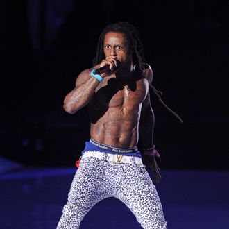 LOS ANGELES, CA - AUGUST 28: Rapper Lil Wayne performs onstage during the 2011 MTV Video Music Awards at Nokia Theatre L.A. LIVE on August 28, 2011 in Los Angeles, California. (Photo by Kevin Winter/Getty Images)