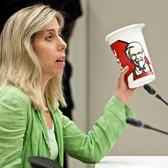 NEW YORK, NY - JULY 24: Lisa Young, PhD, RD, a researcher on portion sizes, adjunct professor at New York University and author of the Portion Teller Plan, speaks in support of a proposed ban on the sale of certain sizes of sugary soft drinks at public hearing in front of the Board of Health at the Department of Health and Mental Hygiene in the Queens borough of New York, July 24, 2012. Under the proposed ban, sugary soft drinks with no nutritional value would not be allowed to be sold in sizes over 16 ounces. The hearing is the only scheduled hearing before the city's board of health votes on the proposal in September. (Photo by Andrew Burton/Getty Images)