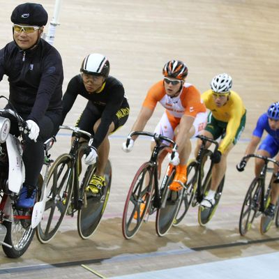 (Second from left) Track cyclists Mohd Azizulhasni Awang of Malaysia, Teun Mulder of the Netherlands, Shane Kelly of Australia, Teun Mulder of the Netherlands, Andrii Vynokurov of Ukraine, Sergey Polynskiy of Russia and Feng Yong of China, compete in the 2008 Beijing Olympic Games men's keirin first round at the Laoshan Velodrome in Beijing on August 16, 2008.