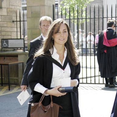 Kate Middleton, the girlfriend of Britain’s Prince William walks during her graduation ceremony at St Andrews, Scotland, 23 June 2005. Prince William, the second in line to the British throne, graduated from university 23 June to embark on a new chapter in his life, which will include work experience in London and a possible army career. The 23-year-old said he was entering the “big wide world” after gaining a masters degree in geography from St. Andrews University, Scotland, where he has spent the past four years tucked away from the prying eyes of the media.   AFP PHOTO/Michael Dunlea/POOL (Photo credit should read MICHAEL DUNLEA/AFP/Getty Images)