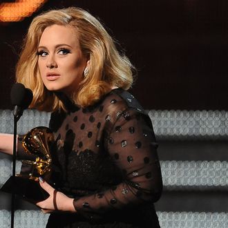 Singer Adele speaks after receiving her Grammy award at the Staples Center during the 54th Grammy Awards in Los Angeles, California, February 12, 2012. AFP PHOTO Robyn BECK (Photo credit should read ROBYN BECK/AFP/Getty Images)