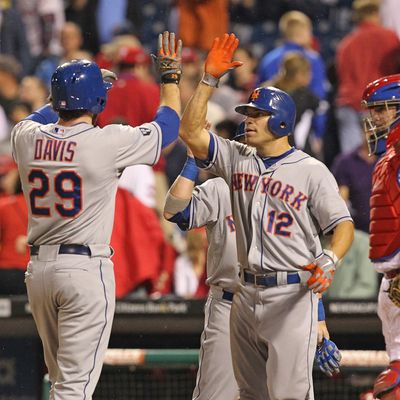 First baseman Ike Davis #29 of the New York Mets is congratulated by right fielder Scott Hairston #12 after hitting a home run during a game against the Philadelphia Phillies at Citizens Bank Park on May 9, 2012 in Philadelphia, Pennsylvania.