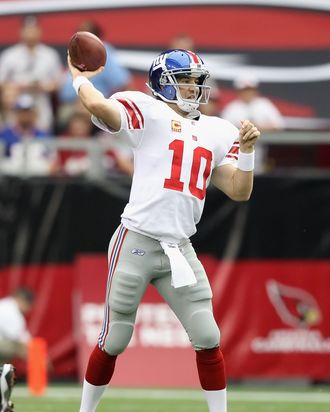 GLENDALE, AZ - OCTOBER 02: Quarterback Eli Manning #10 of the New York Giants throws a pass during the NFL game against the Arizona Cardinals at the University of Phoenix Stadium on October 2, 2011 in Glendale, Arizona. The Giants defeated the Cardinals 31-27. (Photo by Christian Petersen/Getty Images) *** Local Caption *** Eli Manning