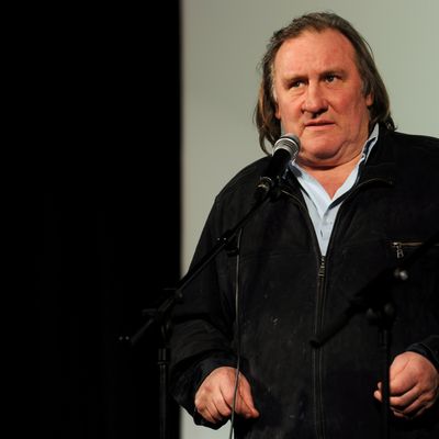 French actor Gerard Depardieu attends the opening of the newly restored Illusion Cinema in Moscow on February 22, 2013. Depardieu, who was granted a Russian passport by President Vladimir Putin after complaining at high tax rates in France, was set to spend today in Moscow before travelling 650 kilometres (400 miles) to the provincial city of Saransk to register as a resident of No. 1 Democracy Street