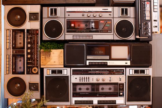 An interactive installation of old boom boxes plays interviews from New York personalities (via headphones).