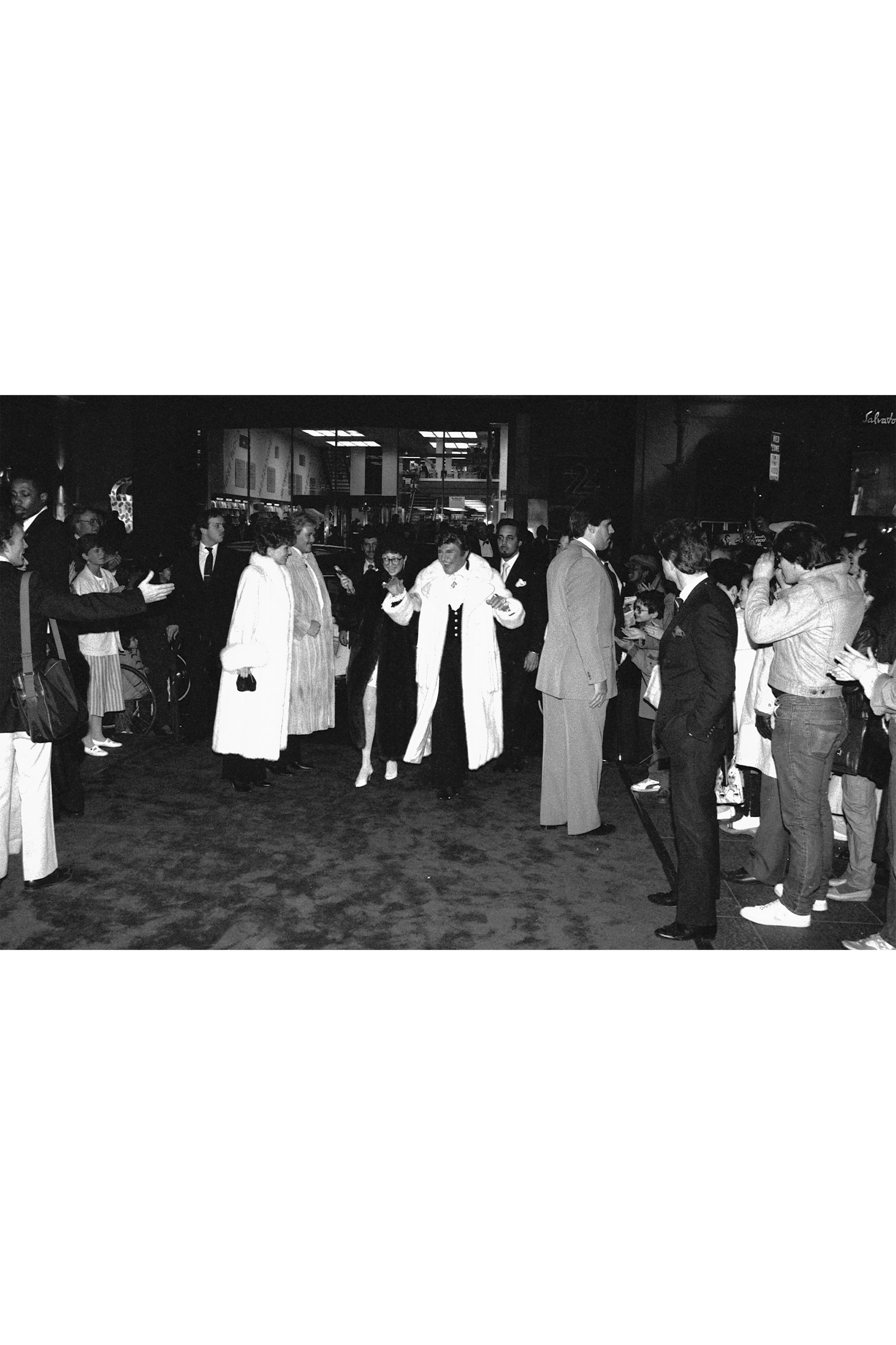 Liberace, with boyfriend Cary James, arrives from his Radio City Music Hall concert for the after-party, 1985. 