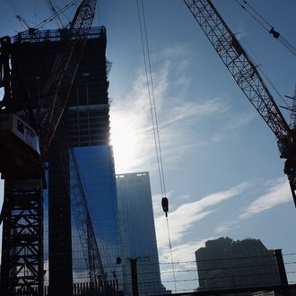 NEW YORK, NY - NOVEMBER 10: Construction continues on the World Trade Center site on November 10, 2011 in New York City. Besides the National September 11 Memorial & Museum at the World Trade Center, the site will feature 550,000 square feet of retail space when completed. (Photo by Spencer Platt/Getty Images)