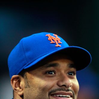 NEW YORK, NY - AUGUST 05: Johan Santana #57 of the New York Mets looks on from the dugout during the game against the Atlanta Braves at Citi Field on August 5, 2011 in the Flushing neighborhood of the Queens borough of New York City. (Photo by Chris Trotman/Getty Images)