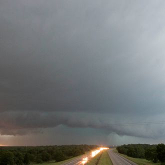 A tornado forms over I-40 as seen looking west from Indian Meridian Road in Midwest City, Okla. on Friday, May 31, 2013. (AP Photo/Alonzo Adams)