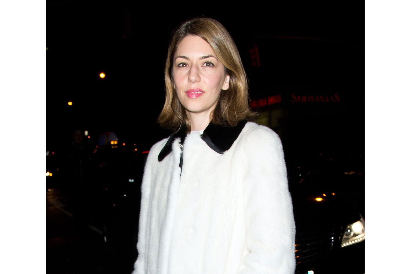 Sofia Coppola is seen wearing black and white faux fur collar coat