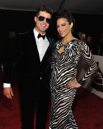  Recording artist Robin Thicke (L) and actress Paula Patton attend the 56th GRAMMY Awards at Staples Center on January 26, 2014 in Los Angeles, California. 