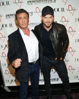 NEW YORK, NY - AUGUST 14: Actors Sylvester Stallone (L) and Kellan Lutz attend the DuJour Summer Cover Celebration With Sylvester Stallone at Provocateur on August 14, 2014 in New York City. (Photo by Monica Schipper/FilmMagic)