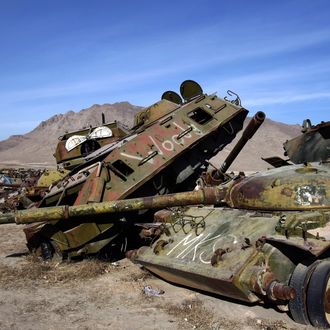 A general overview of a junkyard of Soviet armoured vehicles, planes and tanks at the Kabul Military Training Camp near the capital on January 13, 2010. The USSR began its invasion of Afghanistan in 1979 and installed more than 10,000 troops to support its puppet prime minister who failed to extend power much beyond Kabul, ending in the withdrawal of the Soviets a decade later. AFP PHOTO/ JOEL SAGET (Photo credit should read JOEL SAGET/AFP/Getty Images)