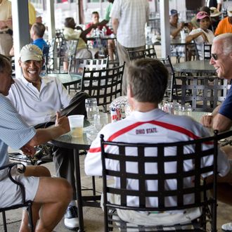 JOINT BASE ANDREWS NAVAL AIR FACILITY, MD - JUNE 18: In this handout image provided by the White House, after playing a round of golf, U.S. President Barack Obama (2L) has a drink with Vice President Joe Biden (R), Speaker of the House John Boehner (L), and Ohio Gov. John Kasich at the clubhouse June 18, 2011 at Joint Base Andrews Naval Air Facility, Maryland. Obama and Boehner edged Vice President Joe Biden and Republican Gov. John Kasich on the 18th hole of the match at a military base outside the capital. The president and the speaker each pocketed a $2 prize. (Photo by Pete Souza/The White House via Getty Images)