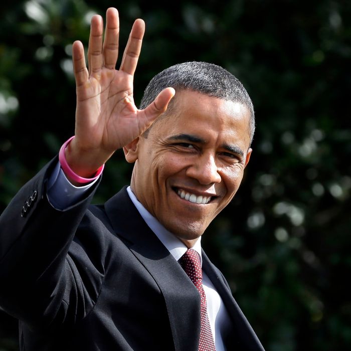 President Barack Obama waves to the media from the south lawn of the White House as prepares to board Marine One in Washington, en route to campaign events in Nashua, N.H., Saturday, Oct. 27, 2012. (AP Photo/Jacquelyn Martin)