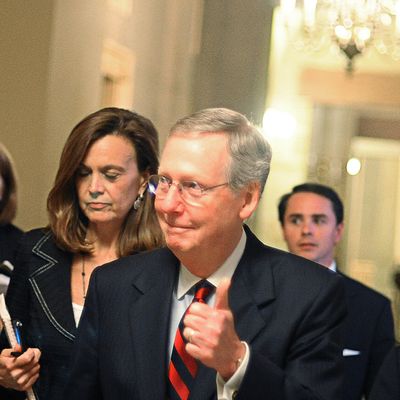 WASHINGTON, DC - JULY 31: (EDITORS NOTE: Retransmission with alternate crop.) U.S. Senate Minority Leader Sen. Mitch McConnell (R-KY) gives a thumbs up when asked whether a deal has been reached regarding the ongoing debate on the national debt reduction on July 31, 2011 in Washington, DC. As the United States approaches the possibility of a default, the congressional leaders and the White House try to reach an agreement on measures to lift the debt ceiling. (Photo by Astrid Riecken/Getty Images)