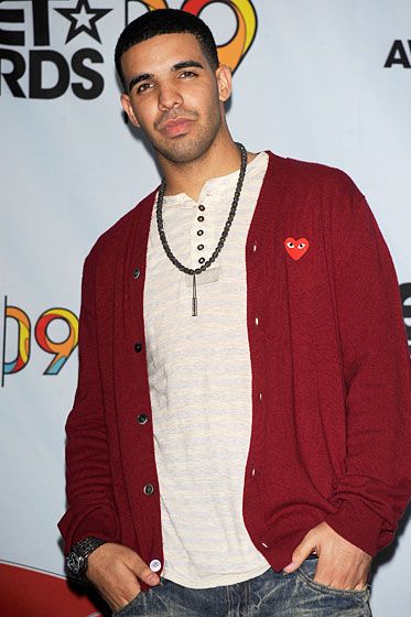 Another Comme des Garçons, but this time, Drake eschews his preferred neutral tones in favor of a bold crimson cardigan —  a reference to Mr. Rogers and, by extension, to Drake's own kid TV stardom. It says, "Yes, I was on Degrassi, and no, I'm not embarrassed by it."