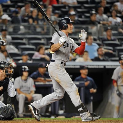 NEW YORK, NY - SEPTEMBER 25: Jacoby Ellsbury #2 of the Boston Red Sox watches his three-run home run in the top of the 14th inning against the New York Yankees on September 25, 2011 at Yankee Stadium in the Bronx borough of New York City. (Photo by Christopher Pasatieri/Getty Images)