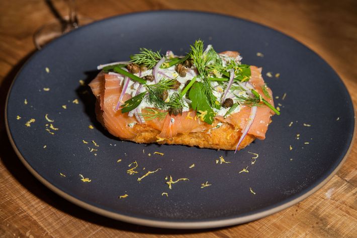 Lángos, or Hungarian fry bread, is topped with house-smoked salmon and &#8220;ranch&#8221; kefir.