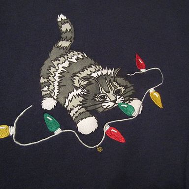 Ugly, Festive (Sexy?) Christmas Sweaters With Cats on Them