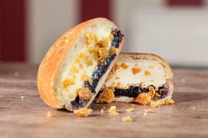 Corn-bread Odd Pocket: corn-bread ice cream, cornflake crunch, and blueberry compote, inside a toasted brioche sandwich.