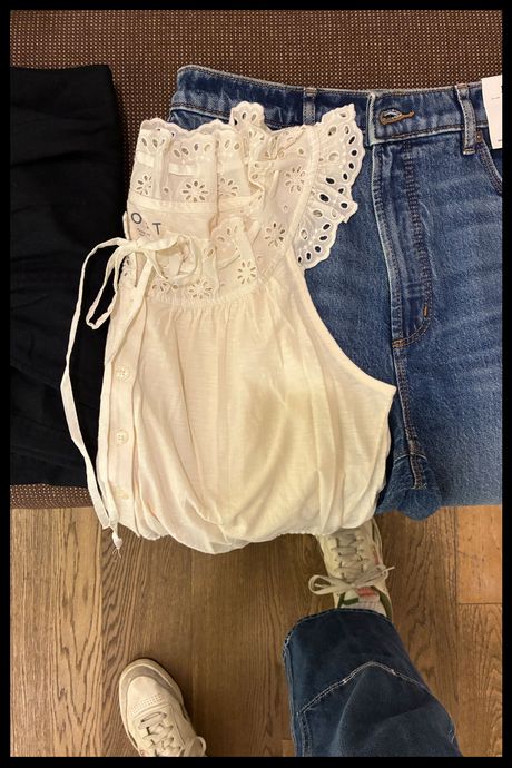 Photo of a top and jeans in the changing room at Ann Taylor Loft.